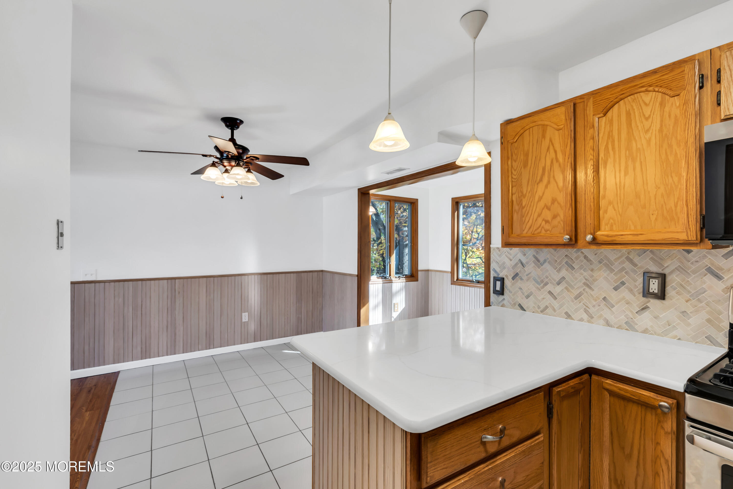 5 Indiana Court, Unit A Matawan, NJ 07747 - Photo 10 of 32 a kitchen with a sink cabinets and window