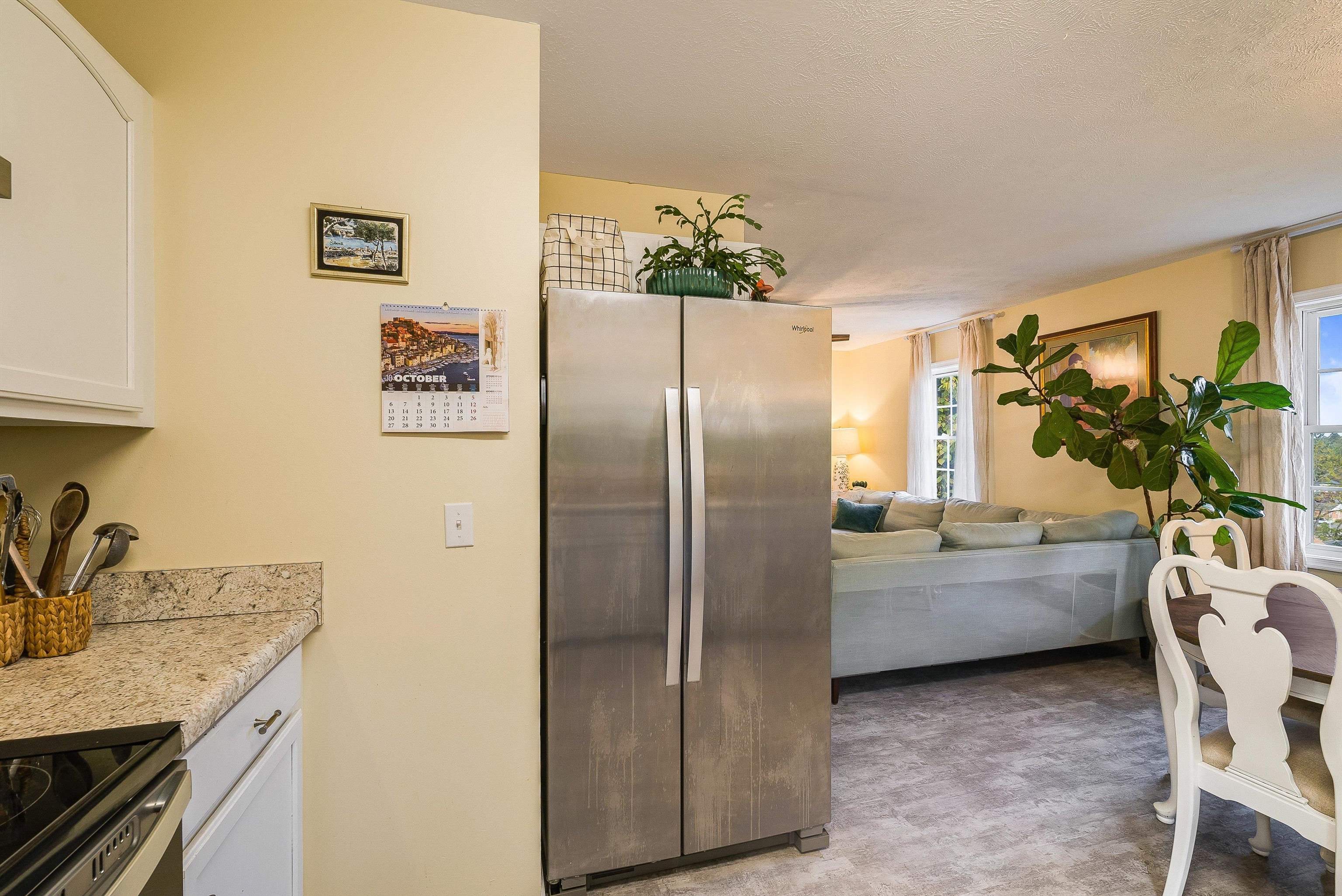 100 Olive Street Staunton, VA 24401 - Photo 11 of 48 a kitchen with stainless steel appliances granite countertop a refrigerator and a sink
