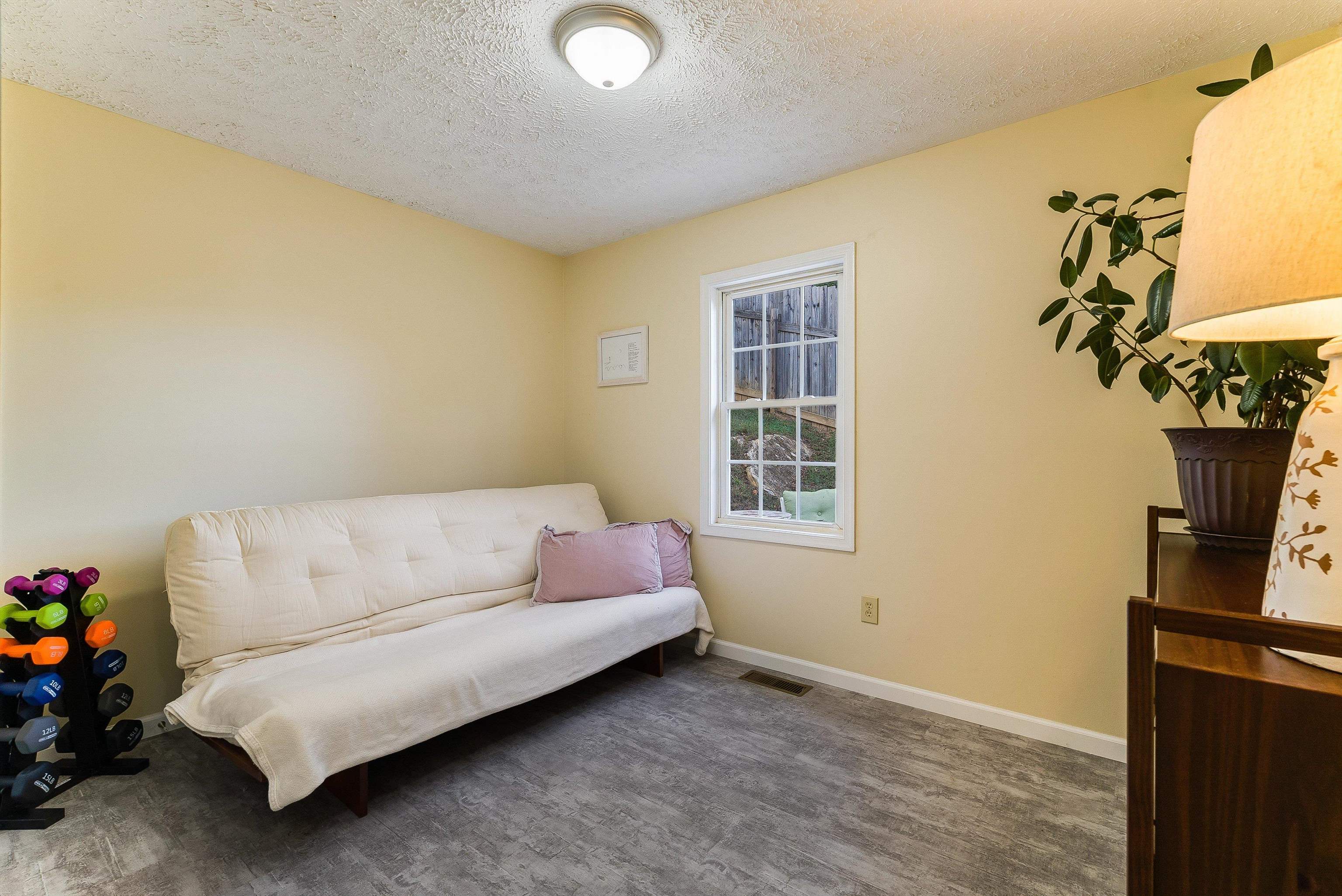 100 Olive Street Staunton, VA 24401 - Photo 19 of 48 a living room with furniture and a window