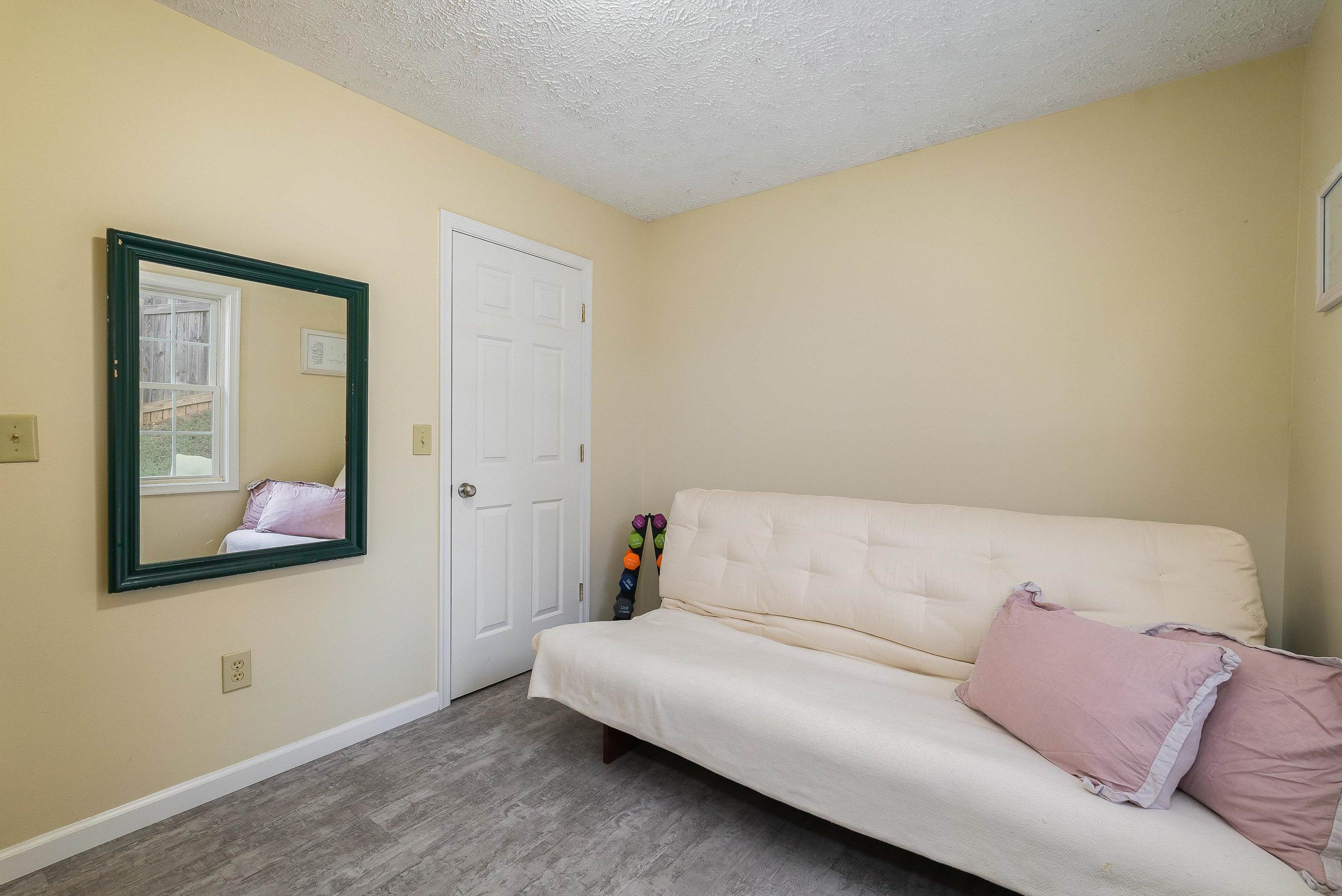 100 Olive Street Staunton, VA 24401 - Photo 20 of 48 a living room with a couch