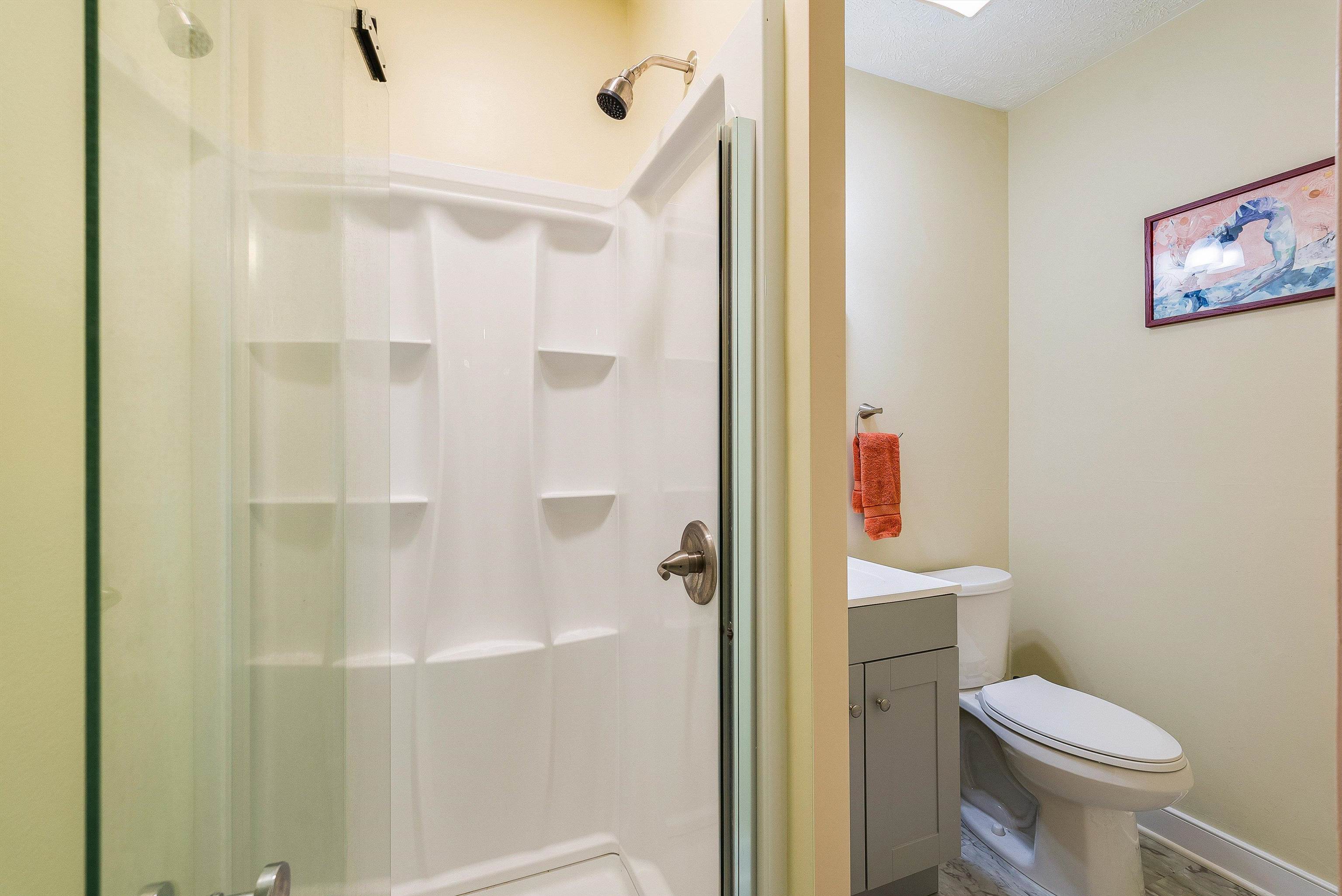 100 Olive Street Staunton, VA 24401 - Photo 23 of 48 a white toilet sitting next to a bathroom sink