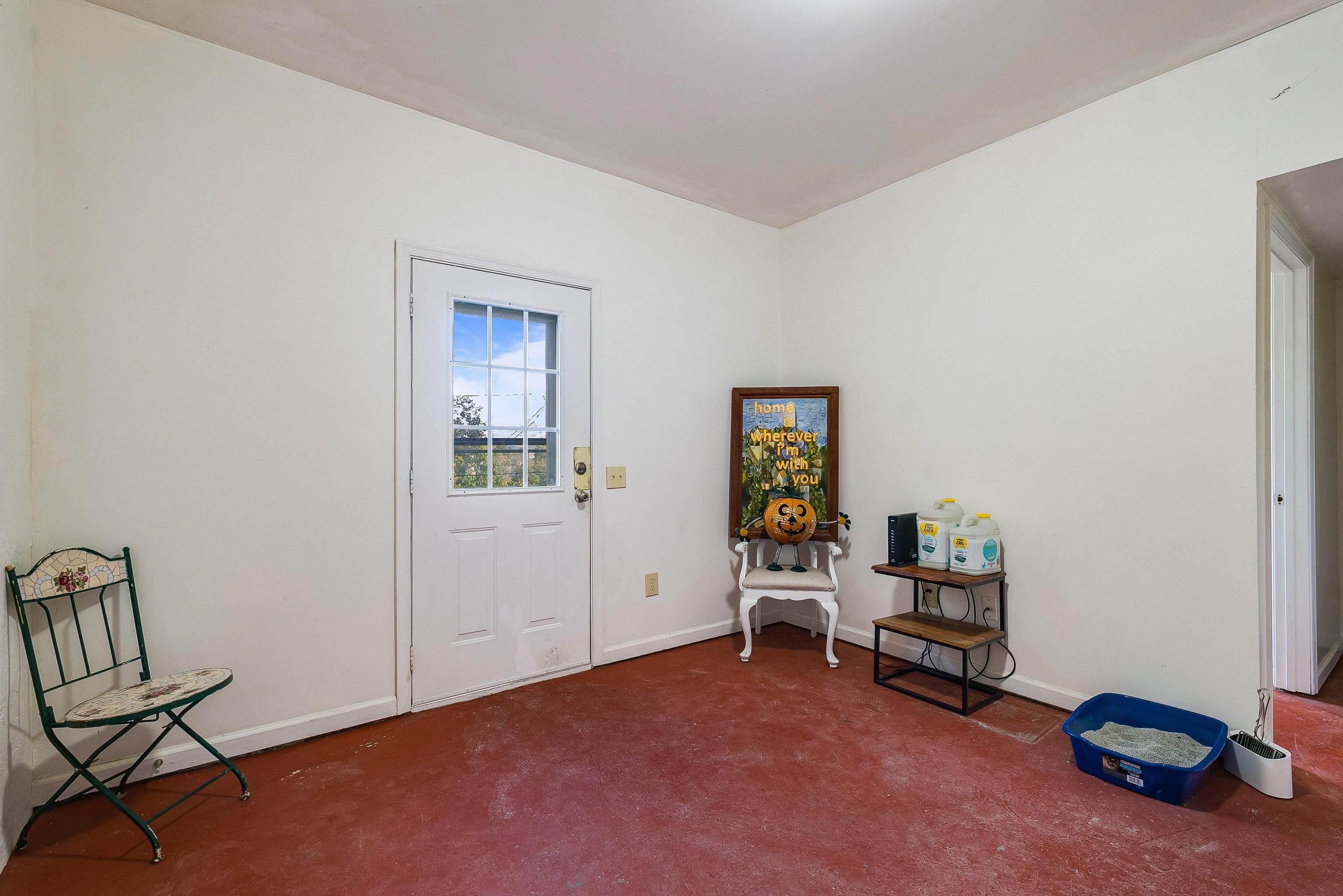 100 Olive Street Staunton, VA 24401 - Photo 26 of 48 a view of a workspace with furniture and a window