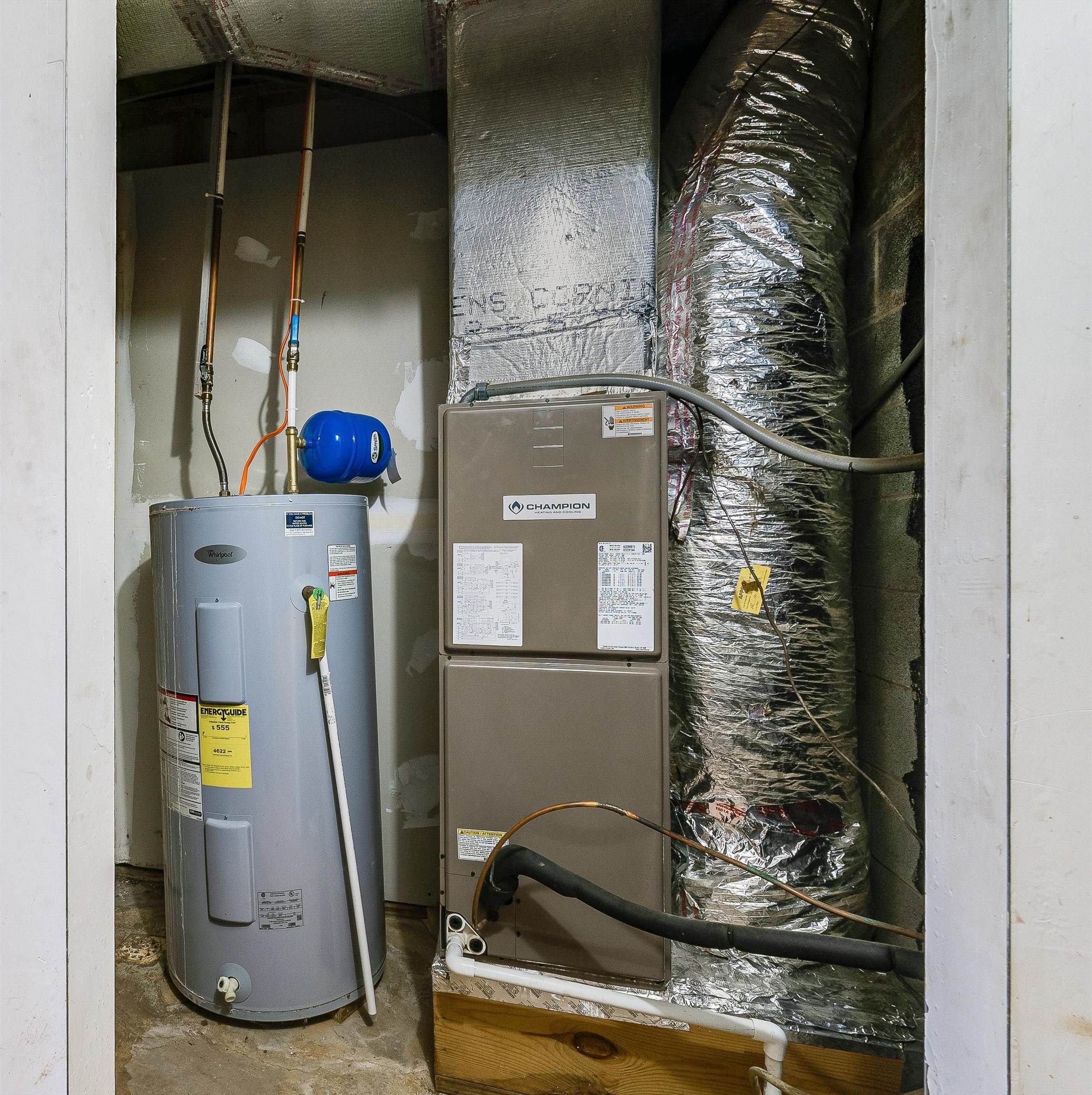 100 Olive Street Staunton, VA 24401 - Photo 30 of 48 a utility room with water heater and racks