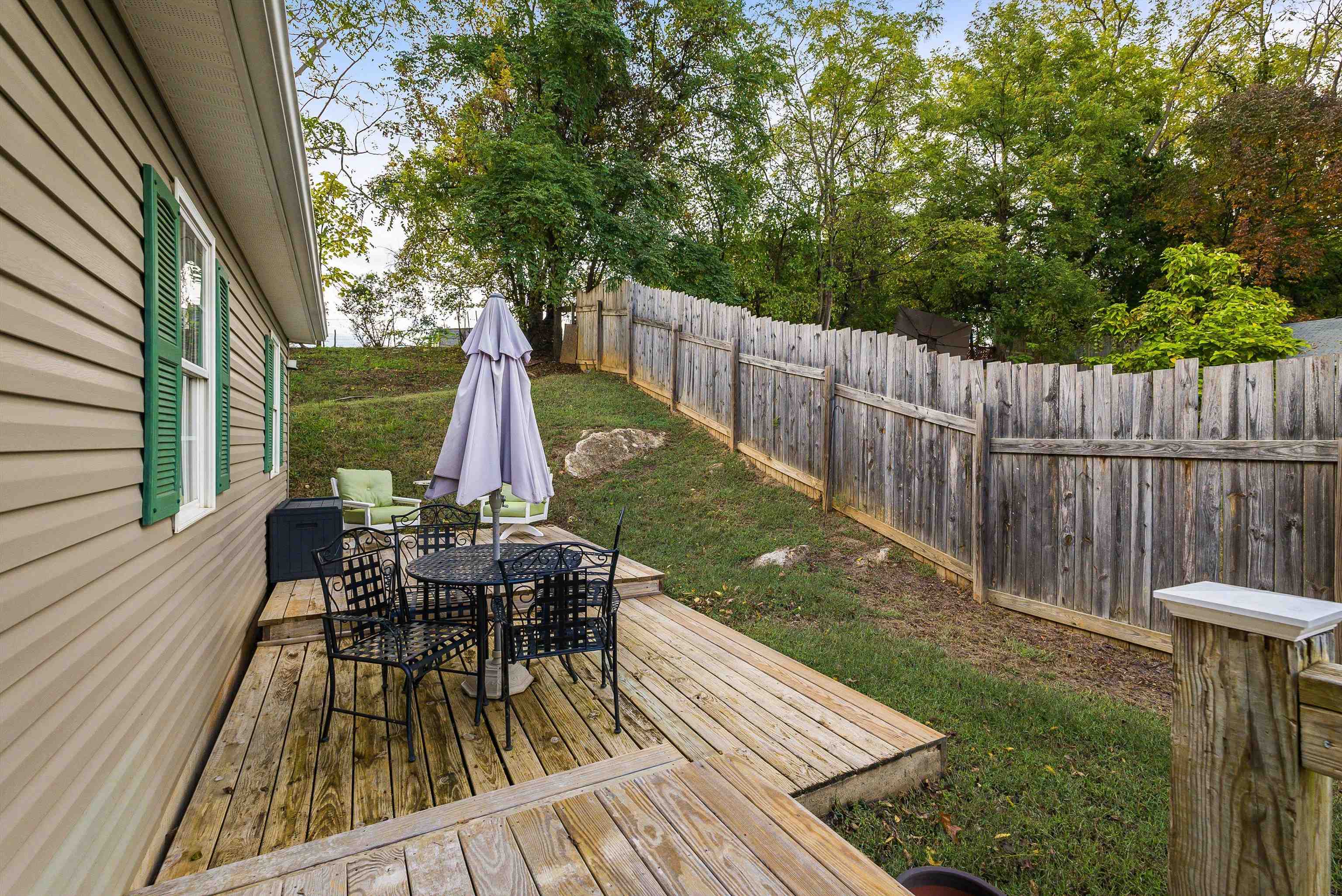 100 Olive Street Staunton, VA 24401 - Photo 31 of 48 a view of a deck with chairs and a yard