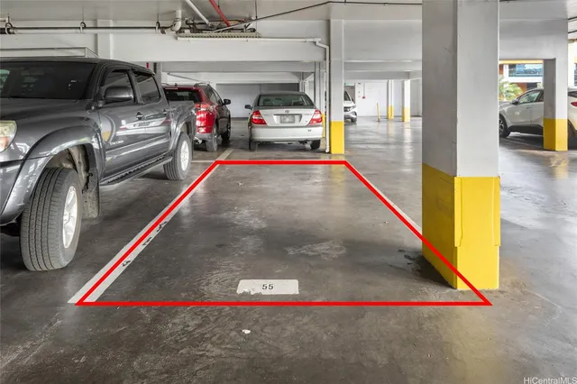 a view of room with stairs and furniture