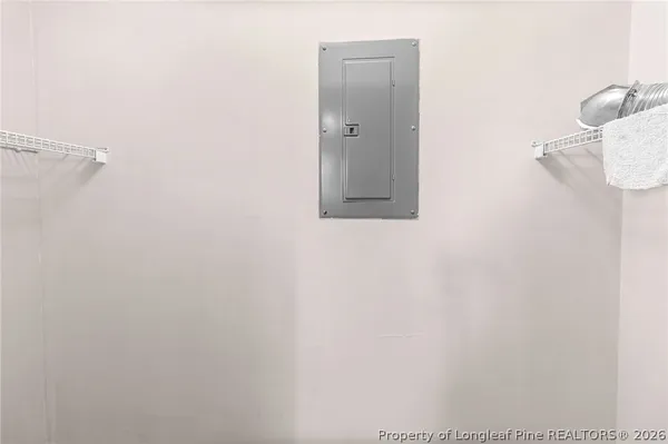a bathroom with a shower and a mirror