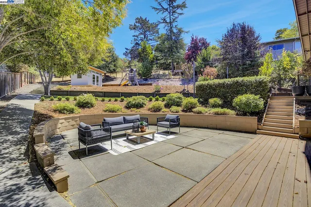 a view of a chairs and tables in the patio