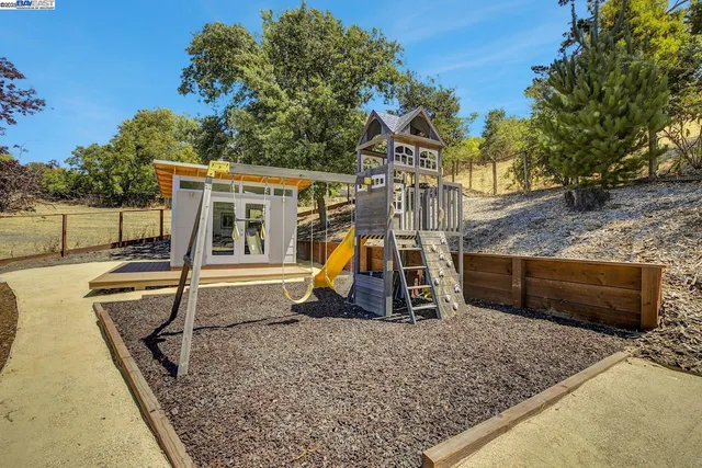 a view of a workspace with furniture