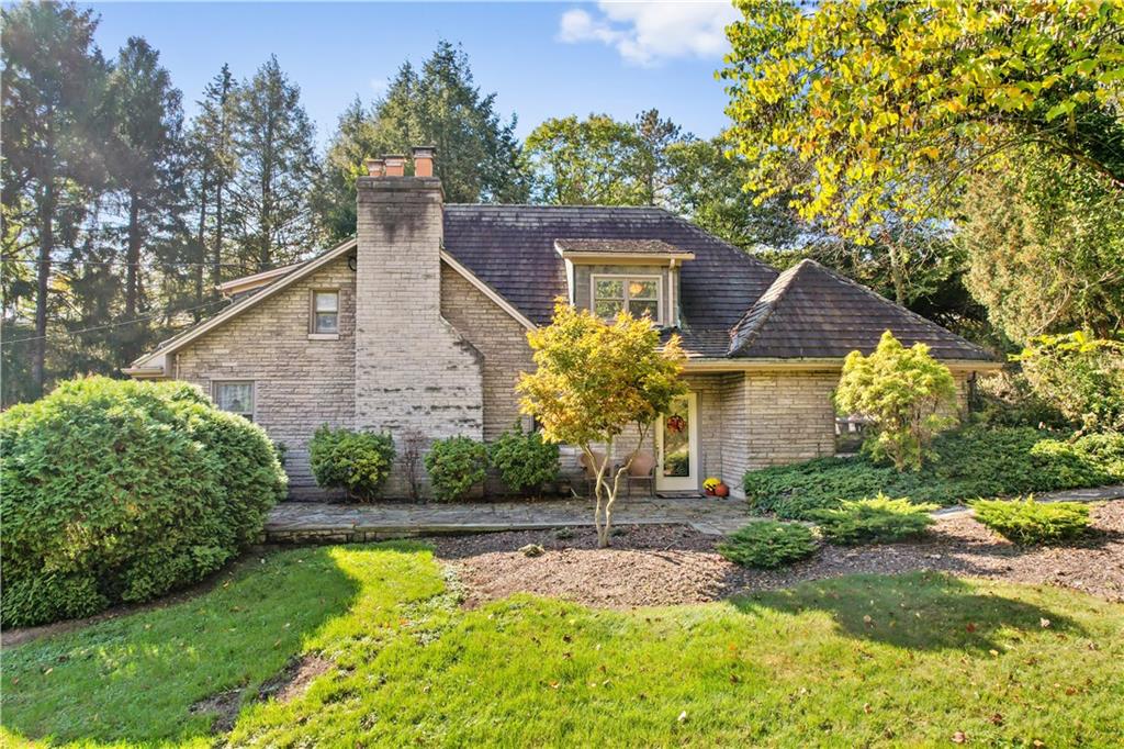 111 Siebert Road Pittsburgh, PA 15237 - Photo 1 of 25 a front view of a house with garden