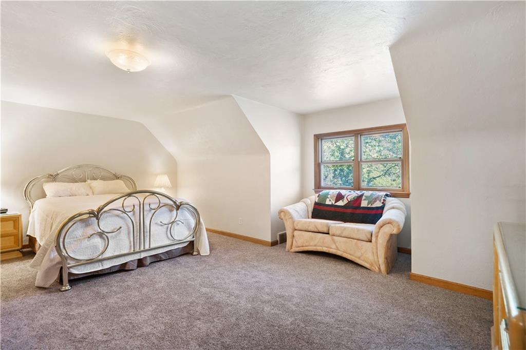111 Siebert Road Pittsburgh, PA 15237 - Photo 18 of 25 a living room with furniture a couch and a window
