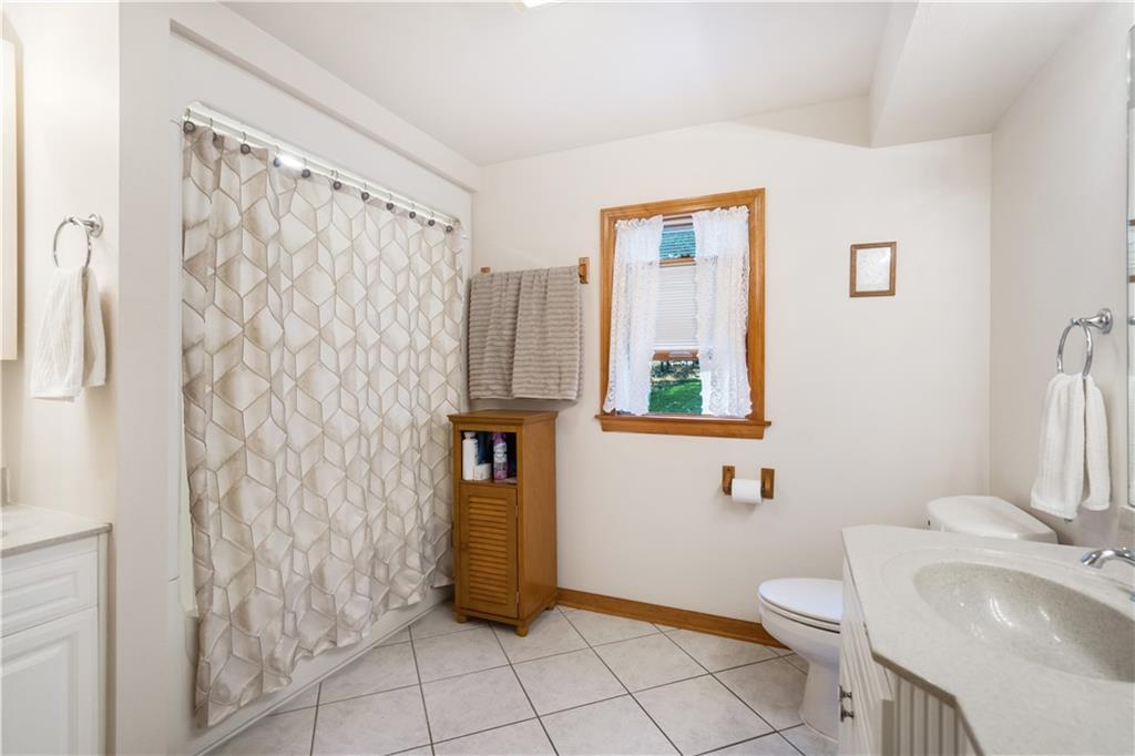 111 Siebert Road Pittsburgh, PA 15237 - Photo 20 of 25 a bathroom with a sink toilet and shower
