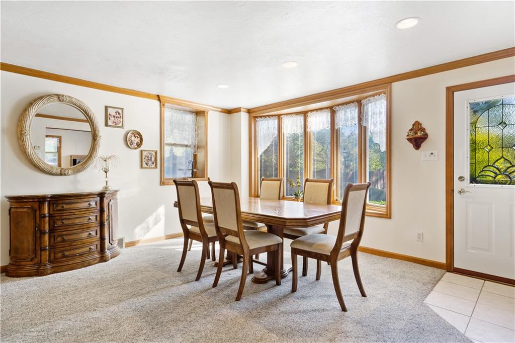 111 Siebert Road Pittsburgh, PA 15237 - Photo 7 of 25 a view of a dining room with furniture and a large window