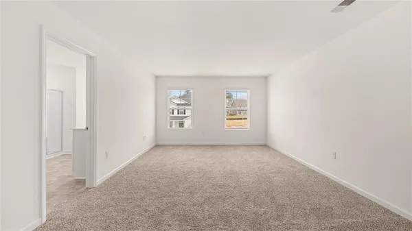 an empty room with windows