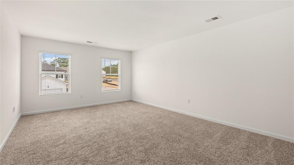 212 Cattle Drive Perry, GA 31069 - Photo 20 of 40 an empty room with windows
