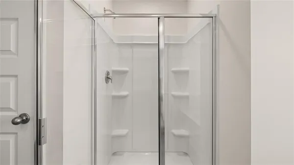 a view of a room with racks on the wall