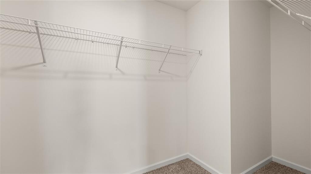 212 Cattle Drive Perry, GA 31069 - Photo 26 of 40 a view of a room with racks on the wall