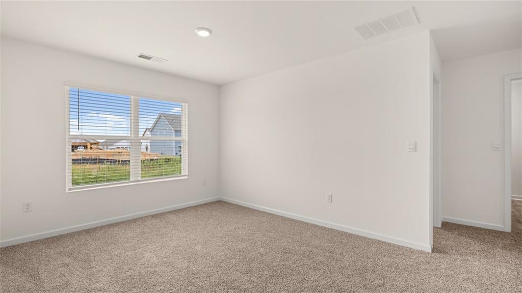 212 Cattle Drive Perry, GA 31069 - Photo 28 of 40 an empty room with windows