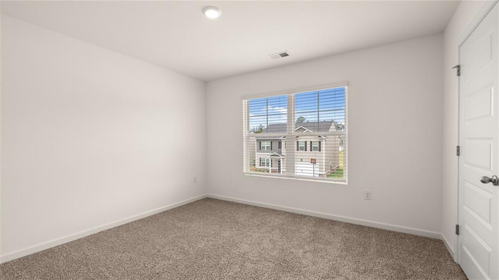 212 Cattle Drive Perry, GA 31069 - Photo 34 of 40 an empty room with a window