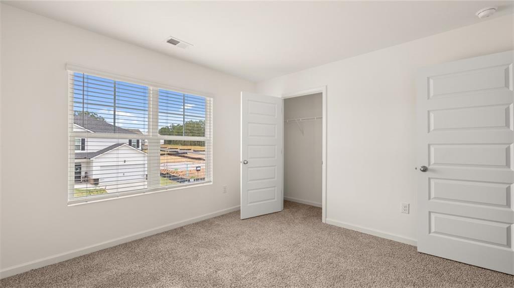 212 Cattle Drive Perry, GA 31069 - Photo 35 of 40 a view of an empty room with a window