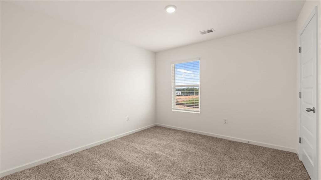 212 Cattle Drive Perry, GA 31069 - Photo 36 of 40 an empty room with a window