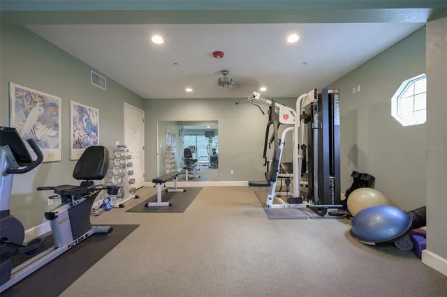 a view of a room with gym equipment
