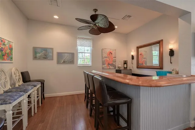 an aerial view of a houses with an outdoor space