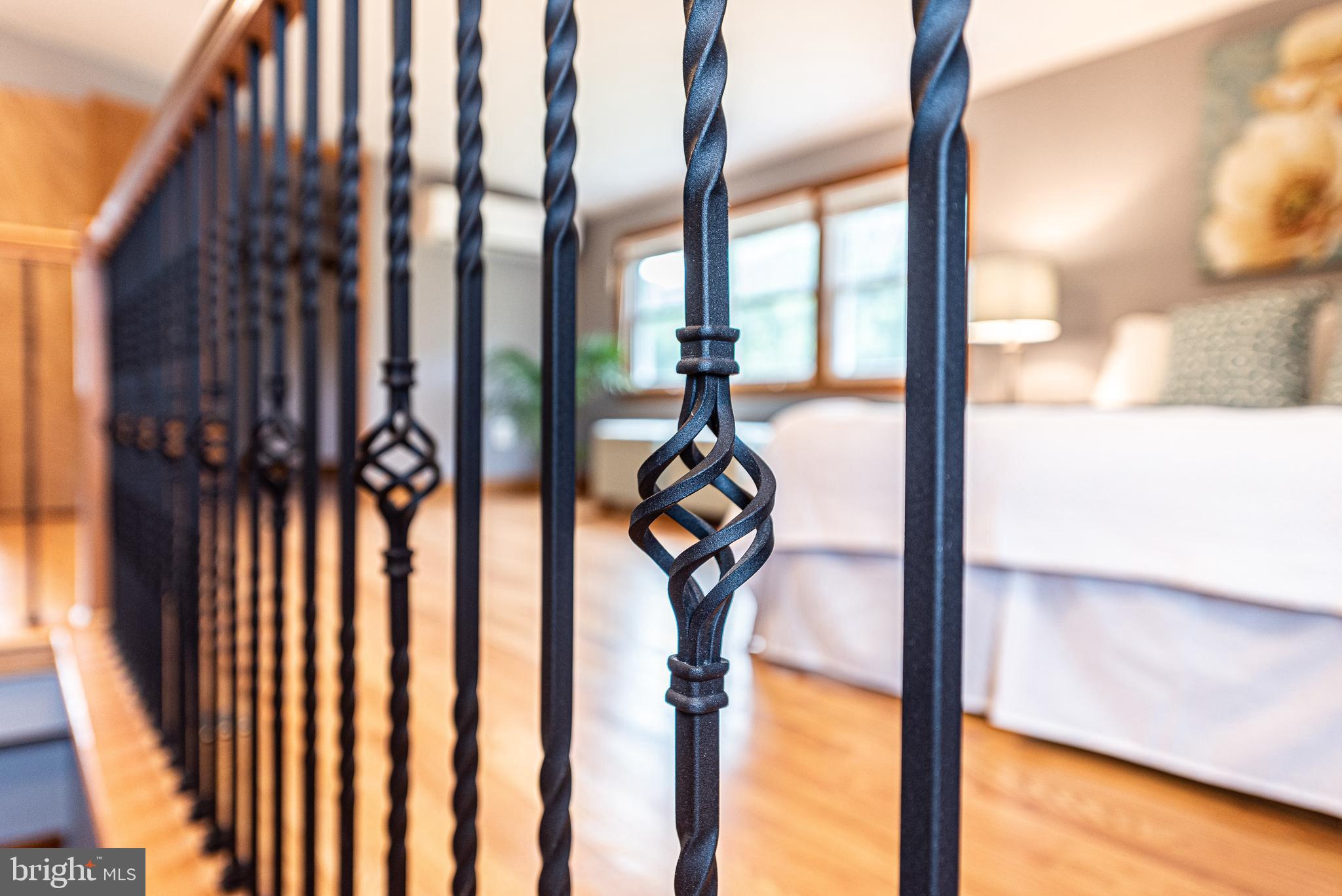 4902 Old Swimming Pool Road Frederick, MD 21703 - Photo 22 of 39 Sellers Chose Wrought Iron Spindles. Very pretty!