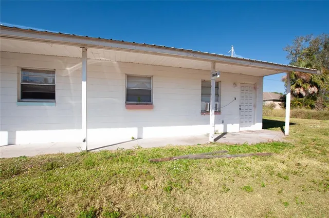 a view of a backyard of a house