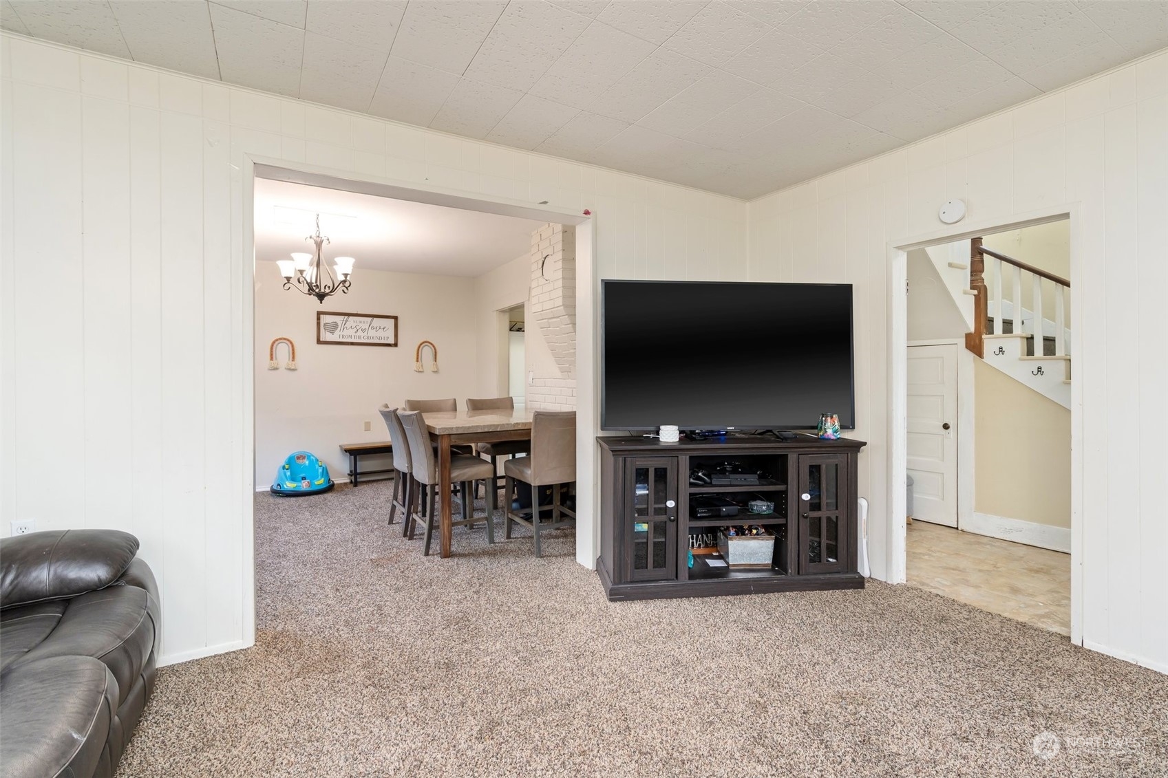 73 East Main Street Chehalis, WA 98532 - Photo 11 of 35 a view of living room with furniture and a flat screen tv