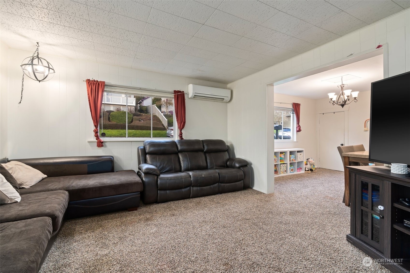 73 East Main Street Chehalis, WA 98532 - Photo 12 of 35 a living room with furniture and a flat screen tv