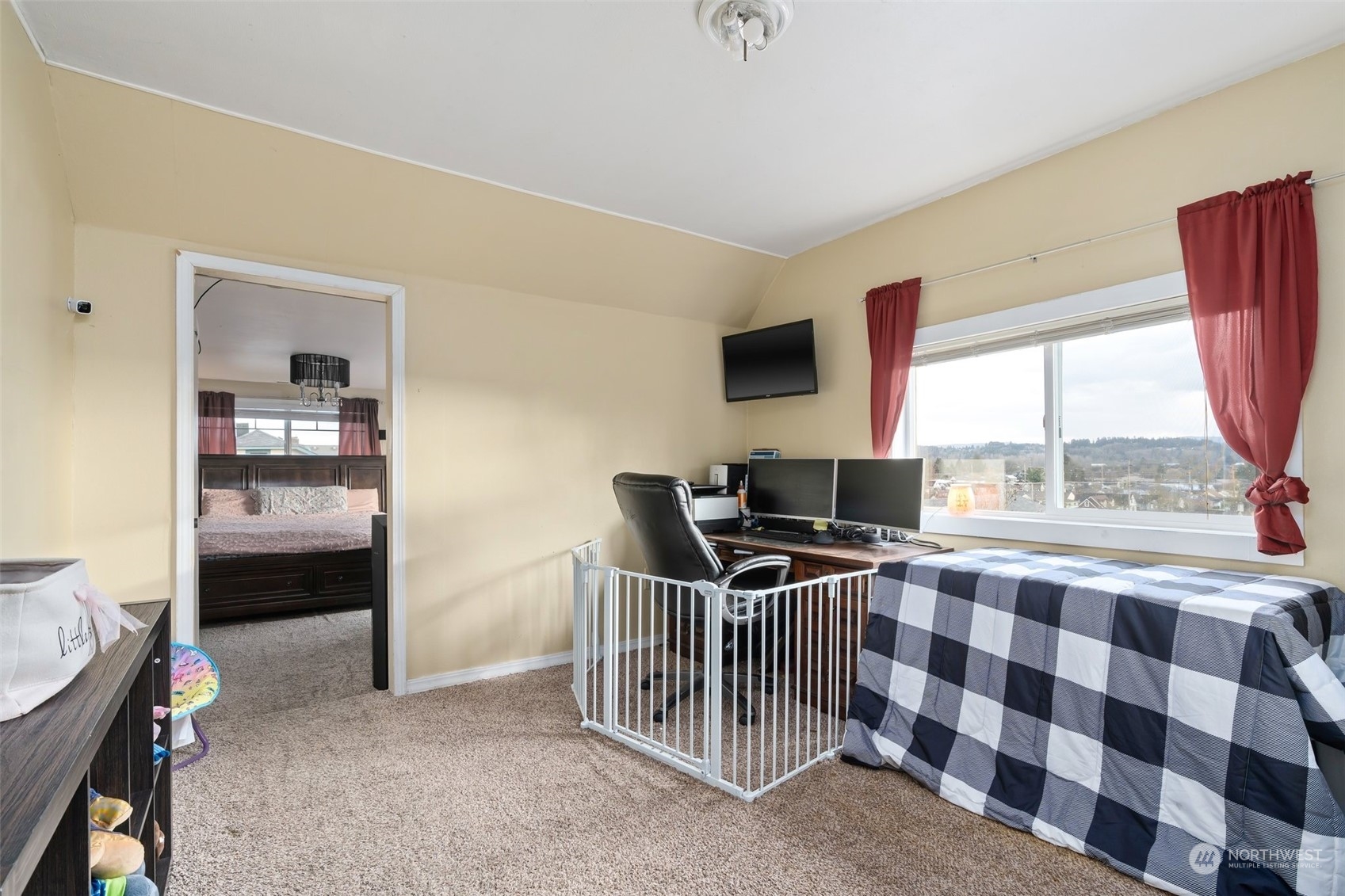 73 East Main Street Chehalis, WA 98532 - Photo 21 of 35 a view of a workspace with furniture and a gate