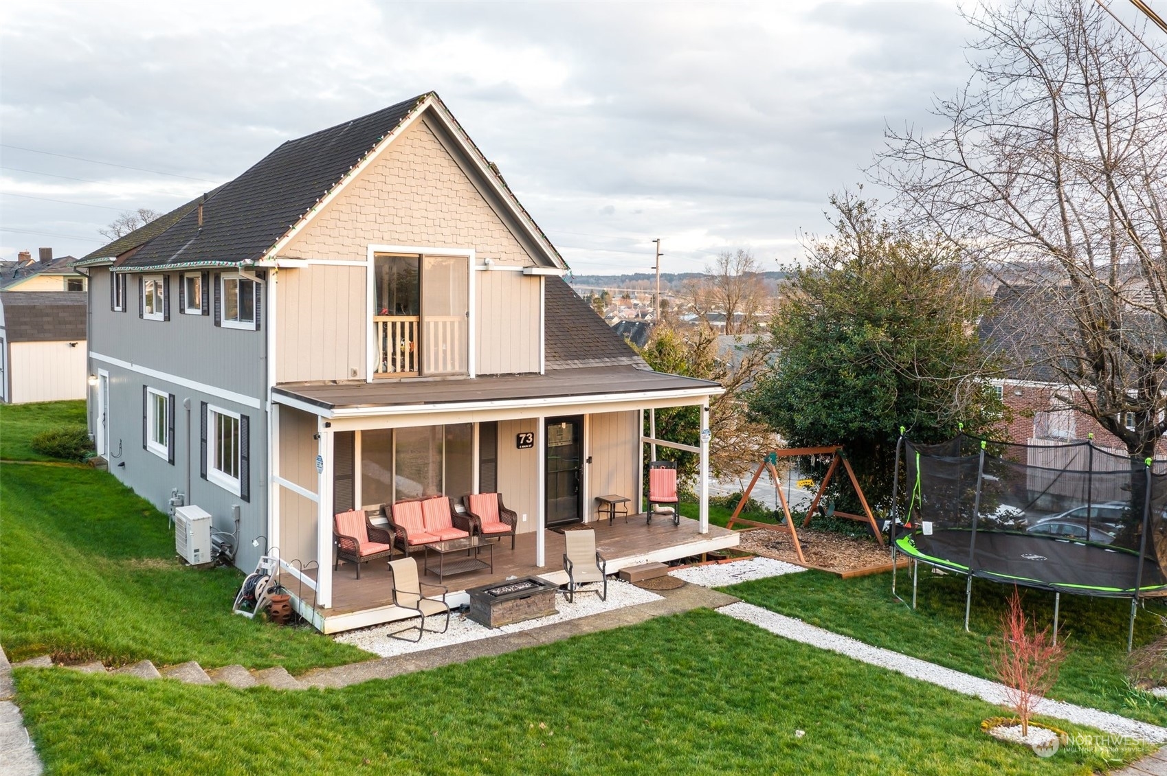 73 East Main Street Chehalis, WA 98532 - Photo 29 of 35 a view of a house with a yard and sitting area