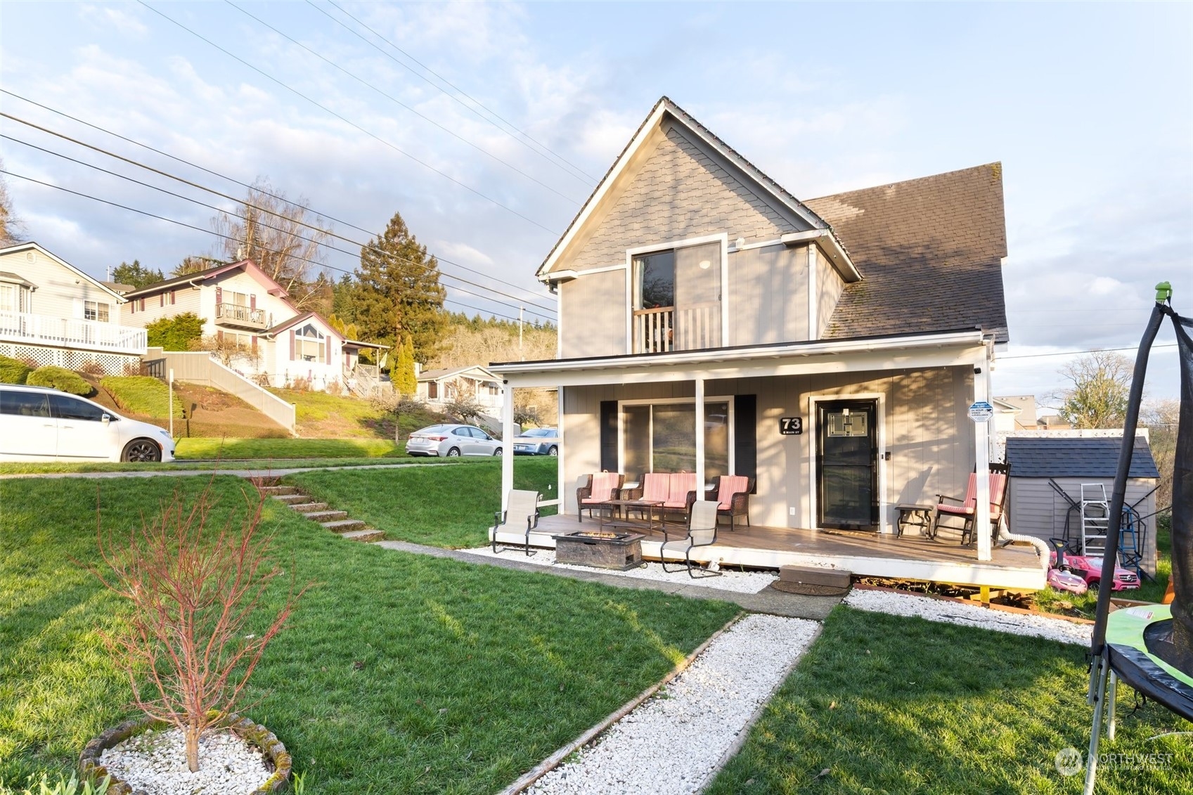 73 East Main Street Chehalis, WA 98532 - Photo 31 of 35 a front view of a house with a yard table and chairs