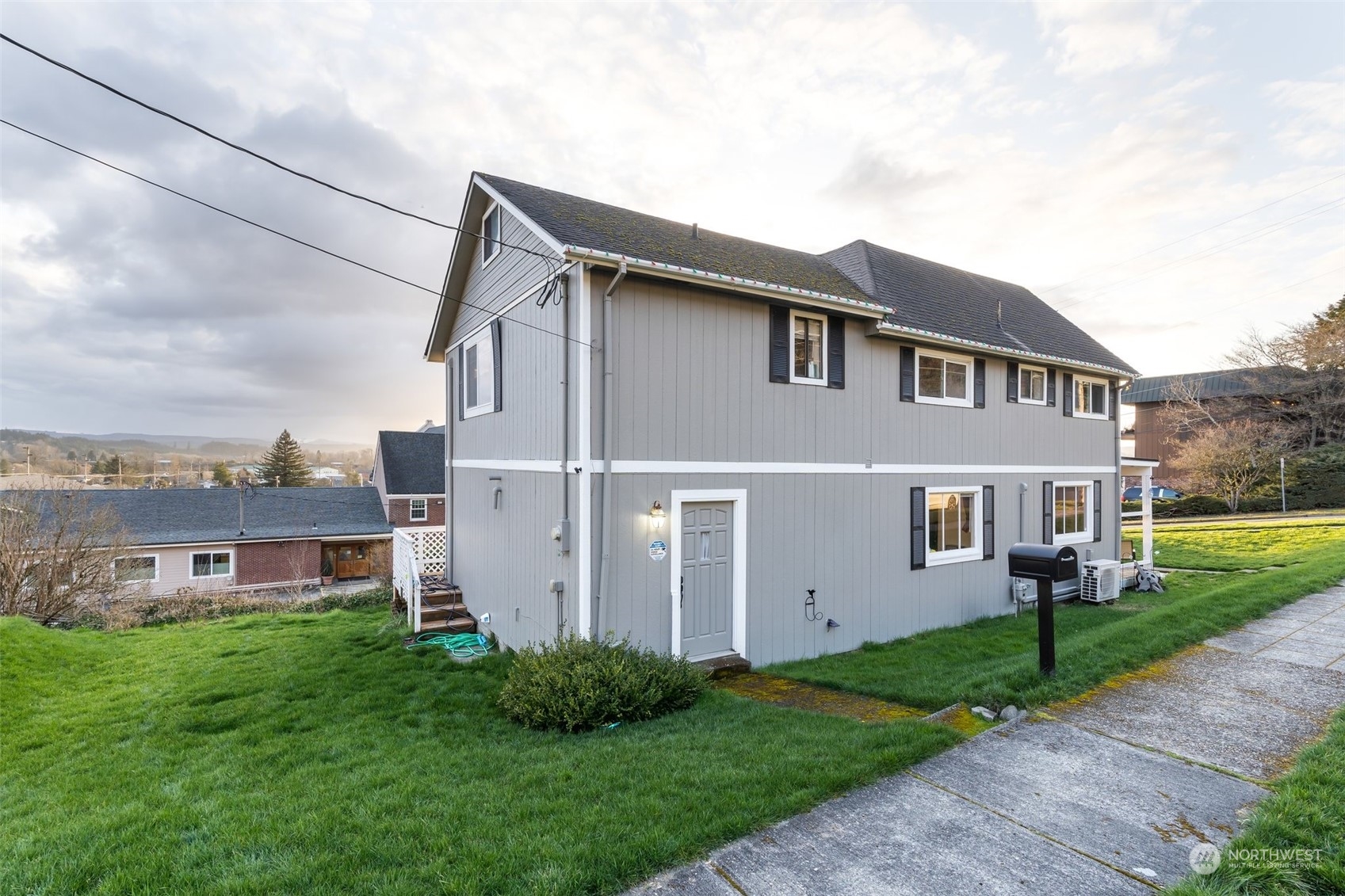 73 East Main Street Chehalis, WA 98532 - Photo 35 of 35 a front view of house with yard and green space