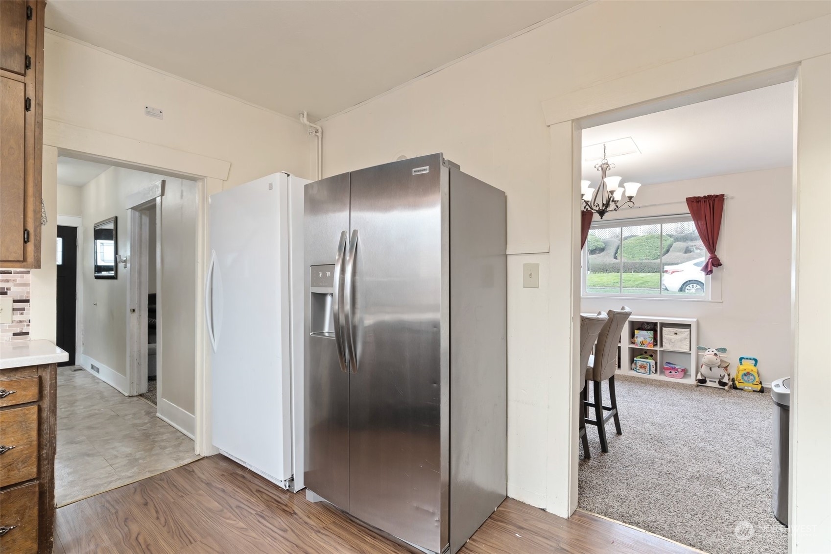 73 East Main Street Chehalis, WA 98532 - Photo 8 of 35 a view of a hallway with wooden floor windows and livingroom