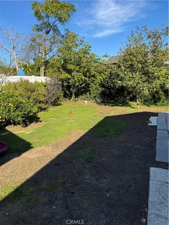 a view of a yard with an outdoor space