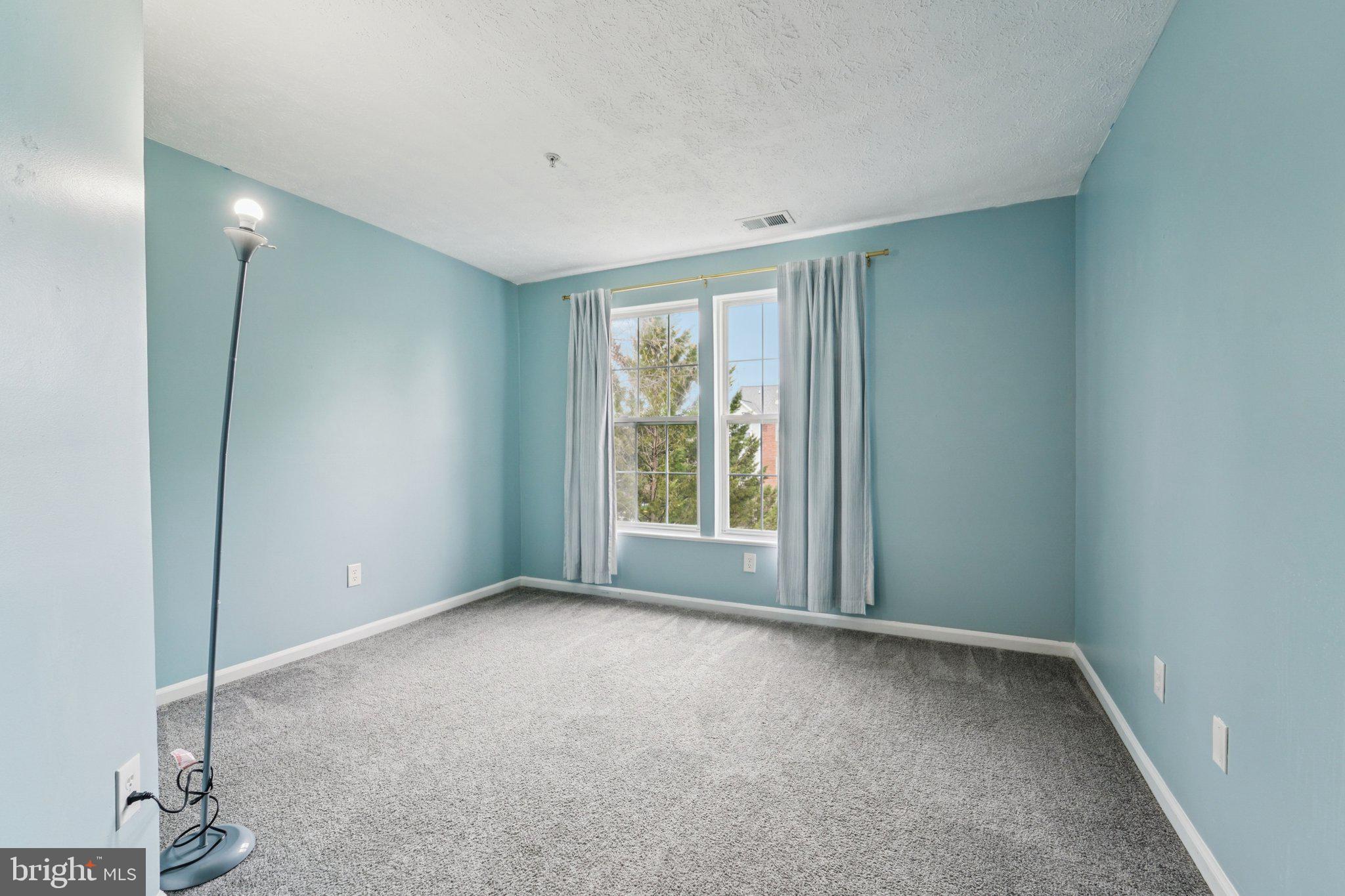 2444 Blue Spring Court, Unit 303 Odenton, MD 21113 - Photo 17 of 24 a view of room with window