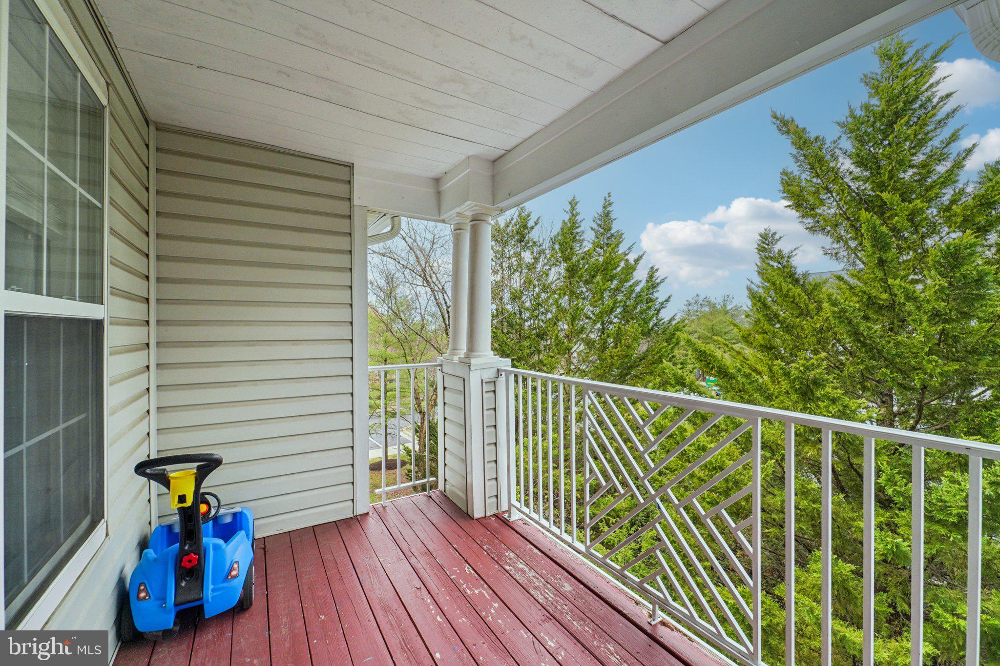 2444 Blue Spring Court, Unit 303 Odenton, MD 21113 - Photo 19 of 24 a view of entryway with wooden floor