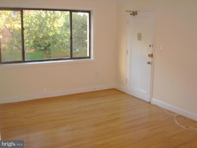 2600 Tunlaw Road Northwest, Unit 4 Washington, DC 20007 - Photo 11 of 15 LIVING ROOM VIEW FROM THE DINING AREA