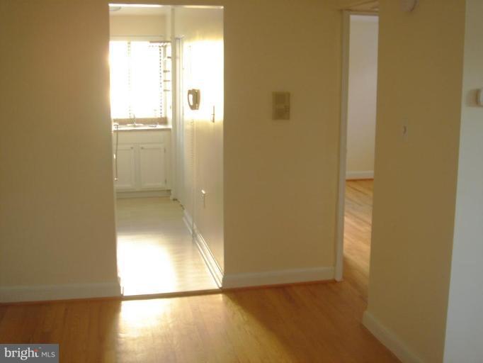 VIEW OF THE KITCHEN FROM DINING ROOM