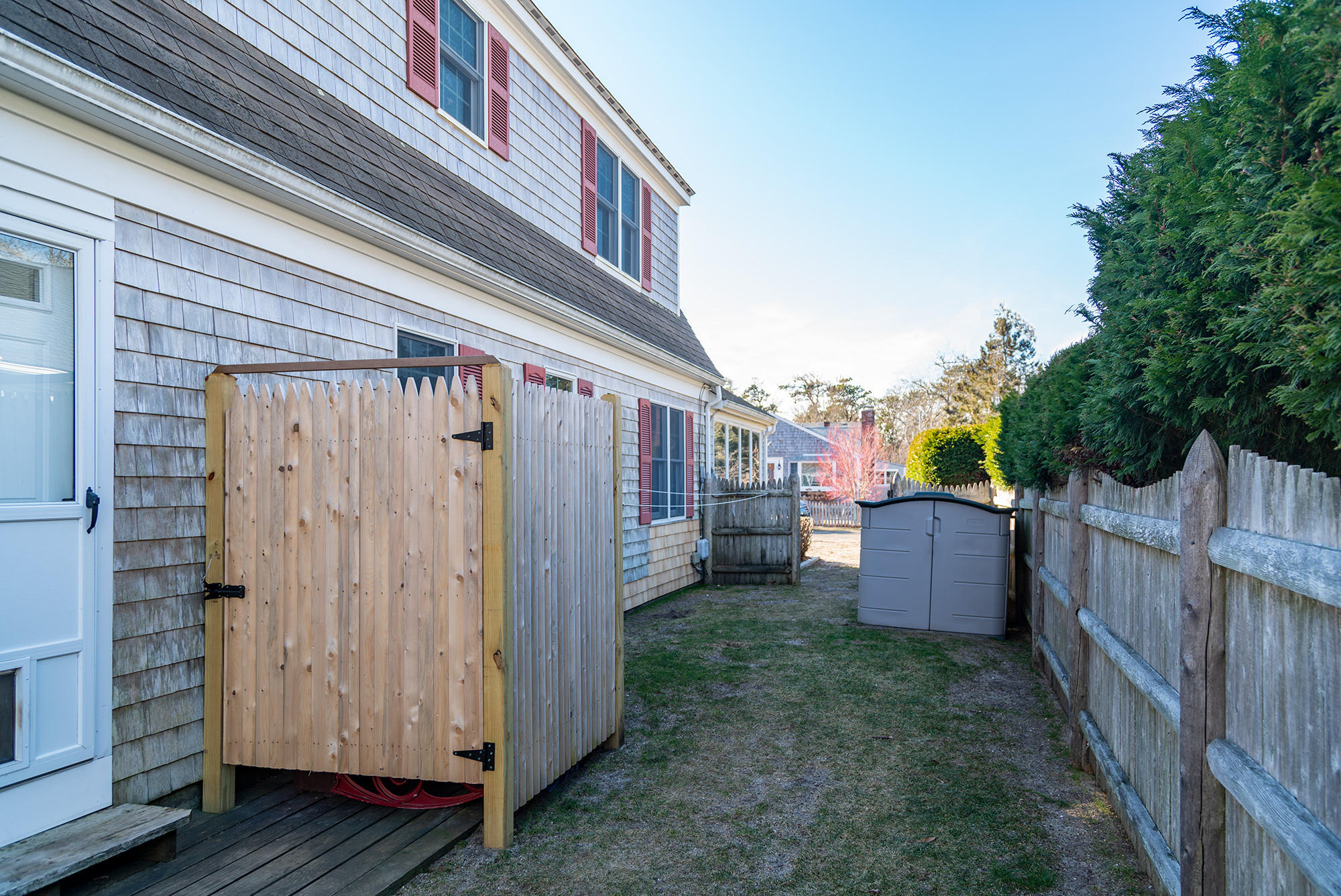 32 Carr Road Dennis Port, MA 02639 - Photo 32 of 35 Outdoor Shower and storage
