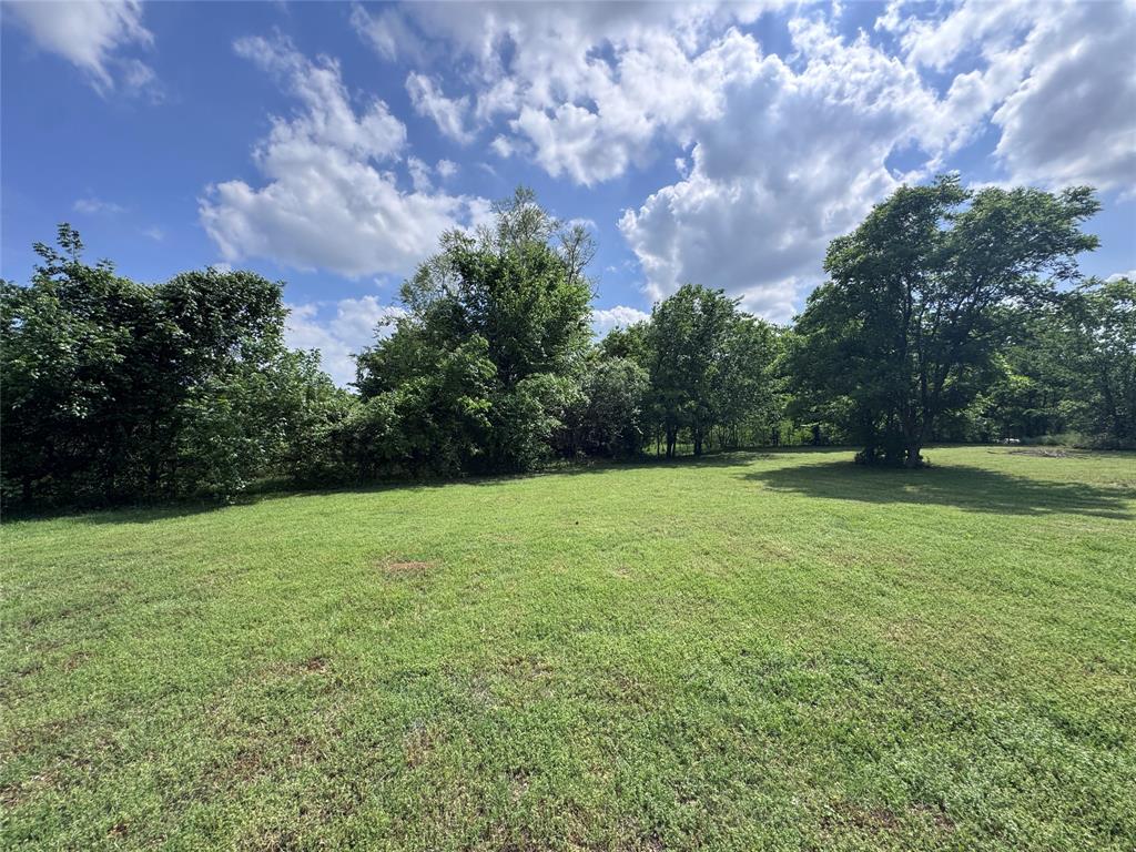 806 Old Base Road Aurora, TX 76078 - Photo 18 of 23 a view of outdoor space with deck and yard
