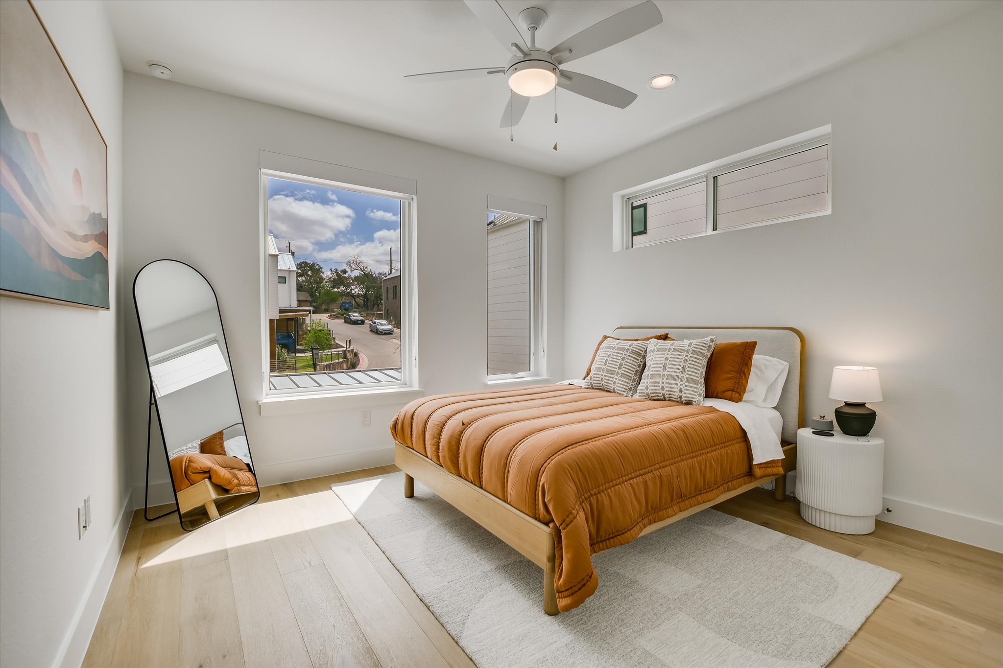 900 South 2nd Street, Unit 6 Austin, TX 78704 - Photo 19 of 25 a bed room with a bed couch and a window