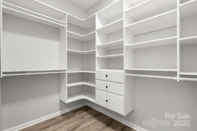 a view of an empty walk in closet