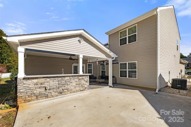 a front view of a house with a garage