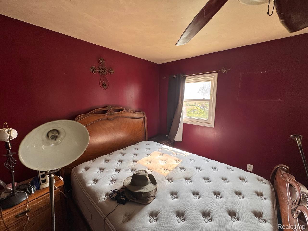 4703 North Byron Road Lennon, MI 48449 - Photo 17 of 25 Room with burgundy walls and a single window