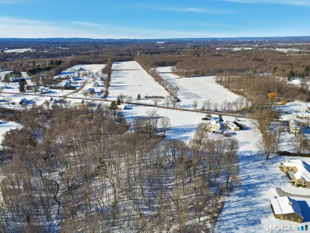 a view of a house with truck parked