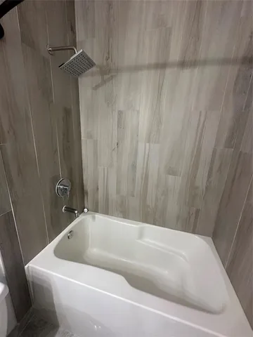 a bathroom with a bathtub