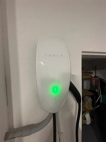 a view of a livingroom with furniture and a mirror