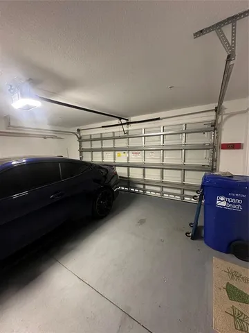 a view of a garage with storage